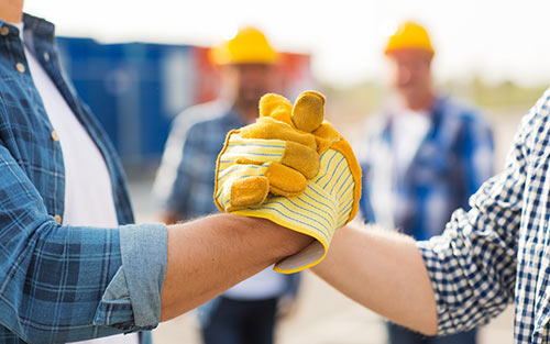 construction workers celebrating success