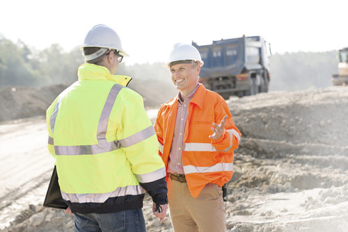 Construction manager leading his team