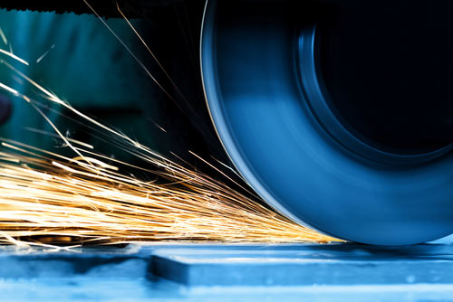 Machine guarding on a saw to comply with OSHA guidelines