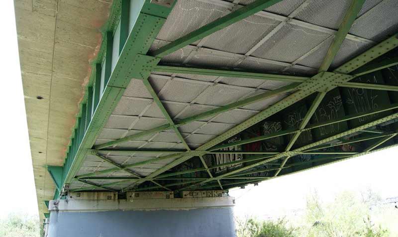 First Line fire blanket installed under a bridge