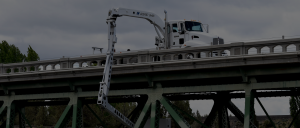 Aspen Aerials B-32 in use on a bridge